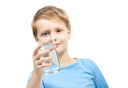 Boy holding a glass of water