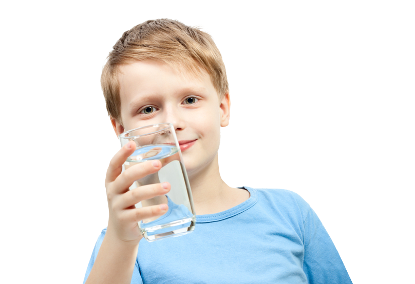 Boy holding a glass of water