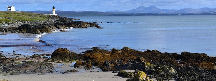 Port Charlotte. Beach with lighthouse