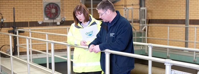 DWQR member of staff with a Scottish Water Employee watching a filter wash